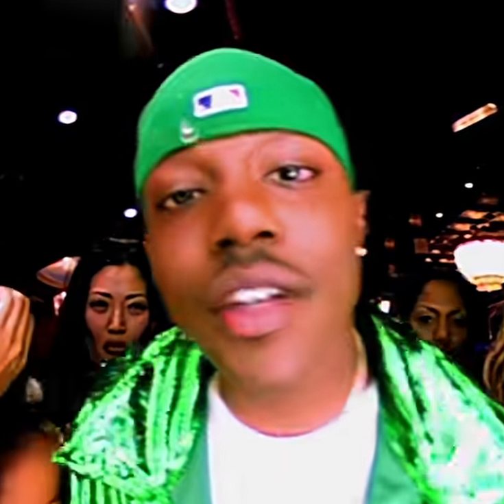 Mase in a green fitted cap and green jacket, Feel So Good video, 1997